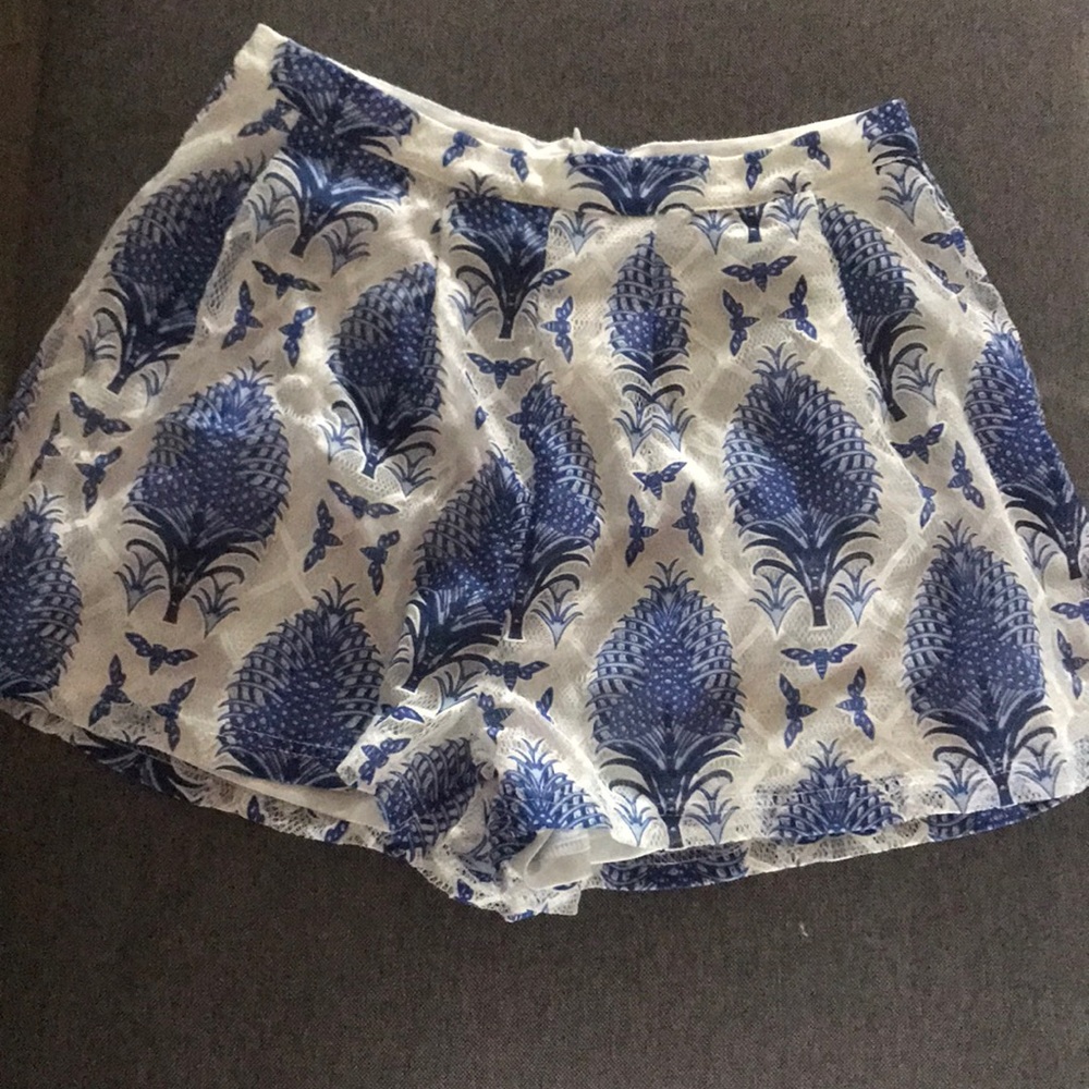 White and blue two piece with zipper.